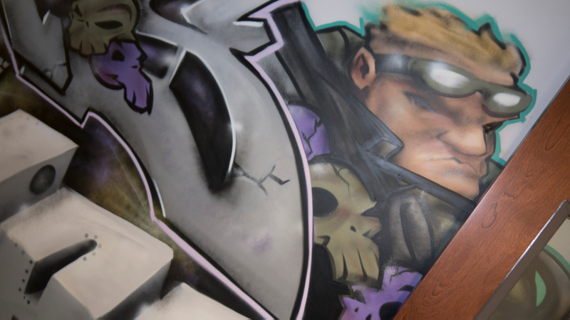 Illustration for article titled Epic Games' History Unfolds in This Graffiti-Covered Stairwell
